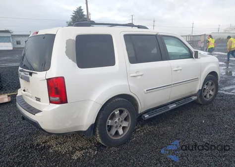 2011 Honda Pilot Touring z USA, uszkodzony, nr VIN 5FNYF4H95BB092349